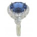 9.12 CT. TW Oval Cut Tansanite In Diamond Halo Accented 14 KT Ring