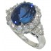 9.12 CT. TW Oval Cut Tansanite In Diamond Halo Accented 14 KT Ring